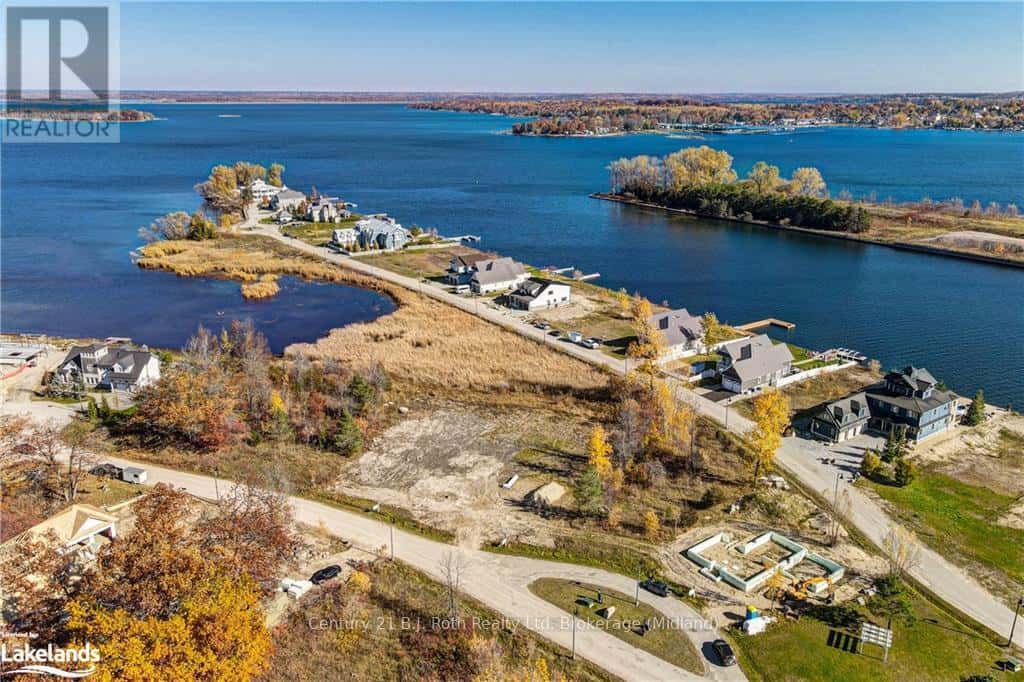 44 - 9 SWAN LANE — Tay (Port McNicoll), Ontario - Photo 3 of 7