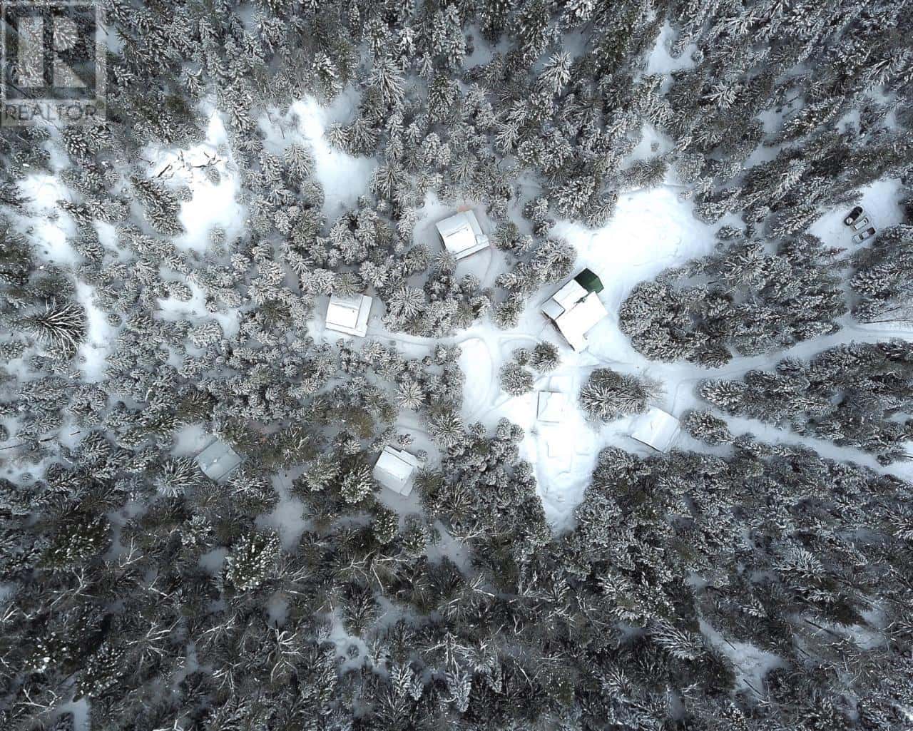 6225 PORTO RICO YMIR Road — Ymir, British Columbia - Photo 4 of 99