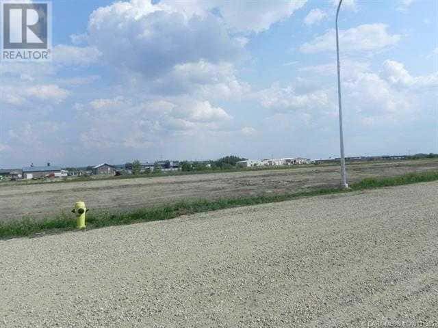 5384 Len Thompson Drive — Lacombe, Alberta - Photo 3 of 4