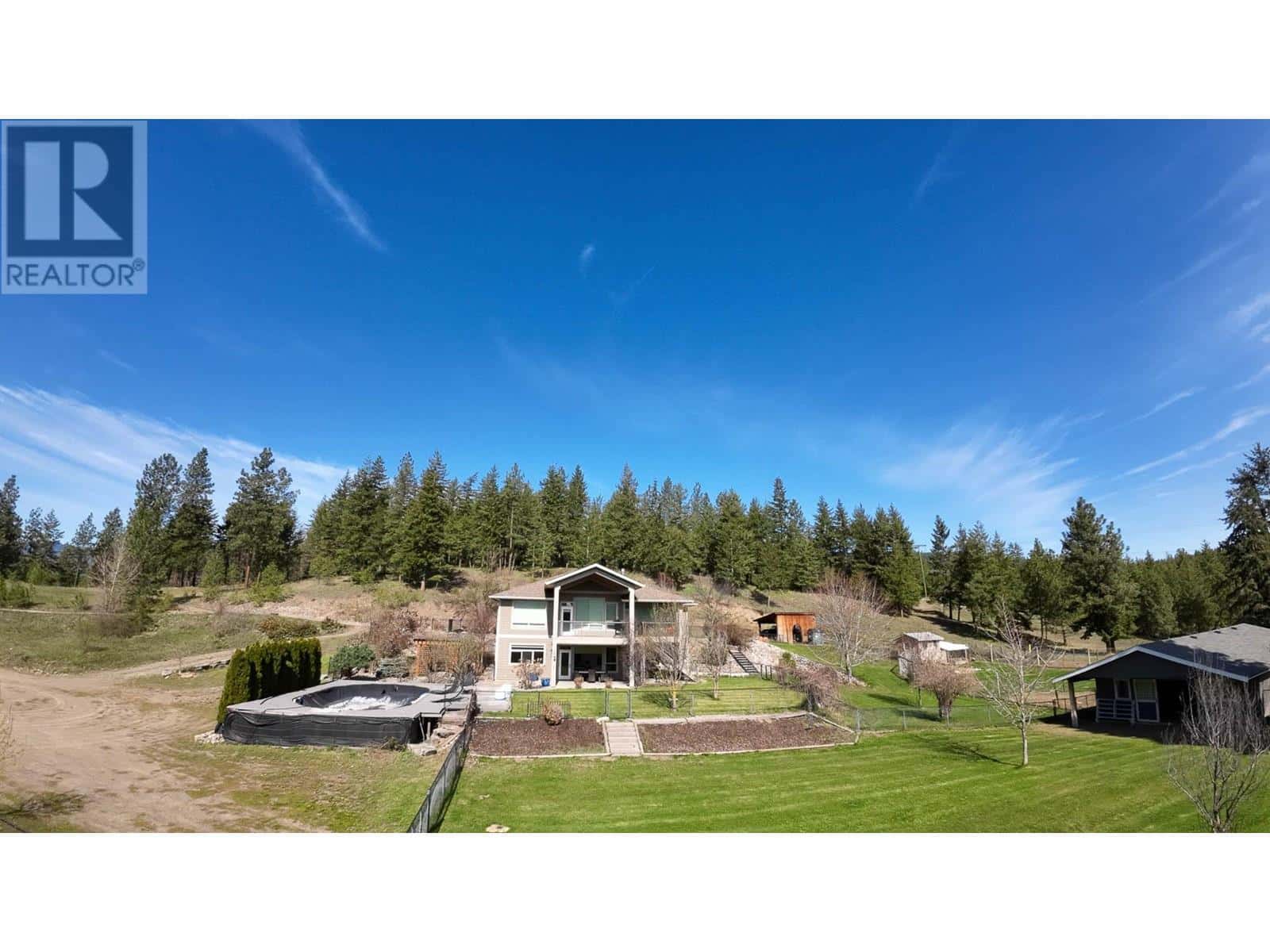 3888 Salmon River Road — Falkland, British Columbia - Photo 2 of 57