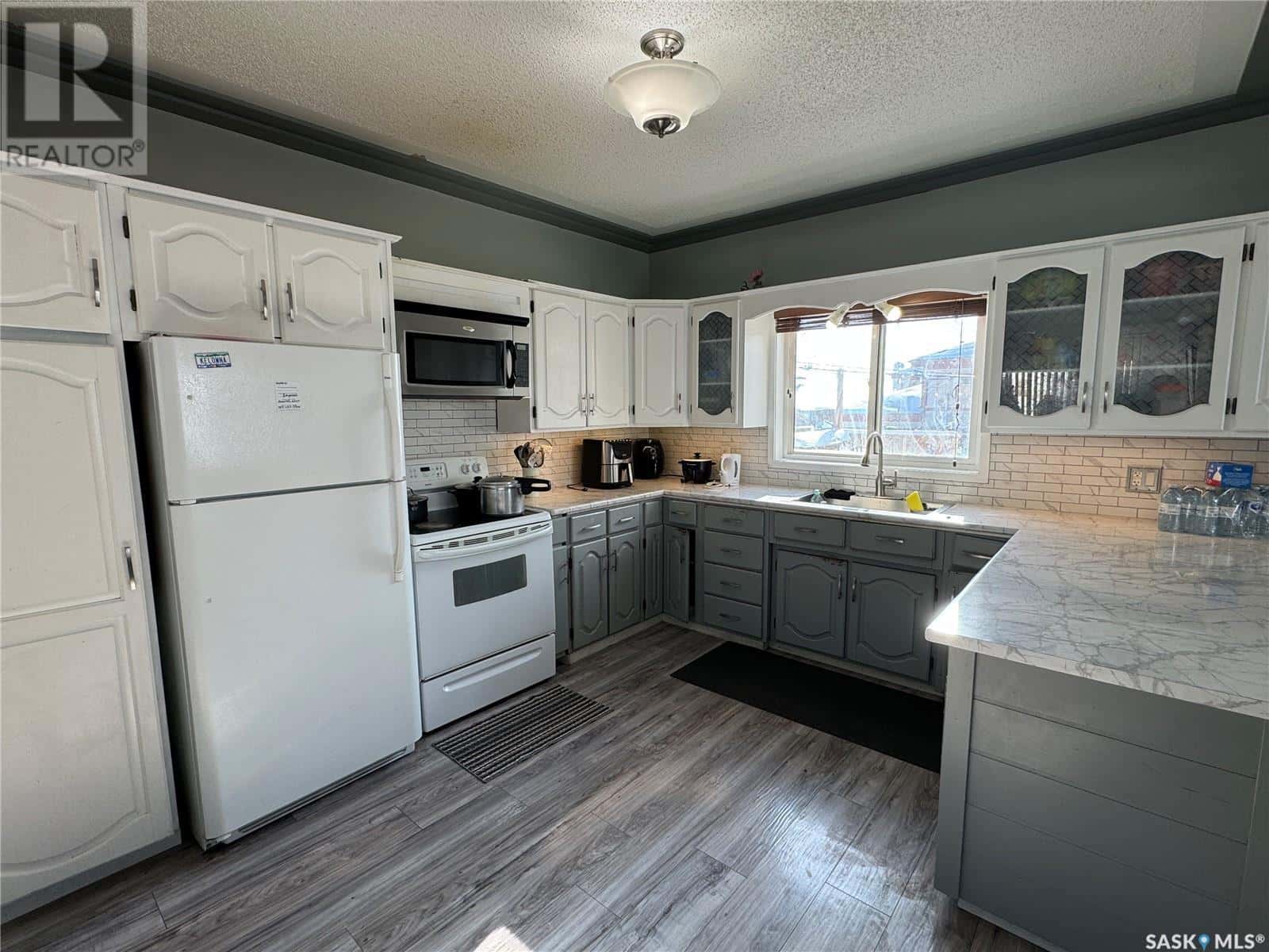 114 2ND AVENUE W — Biggar, Saskatchewan - Photo 5 of 31