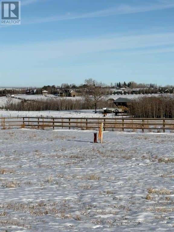 48024 295 Avenue E — De Winton, Alberta - Photo 2 of 6