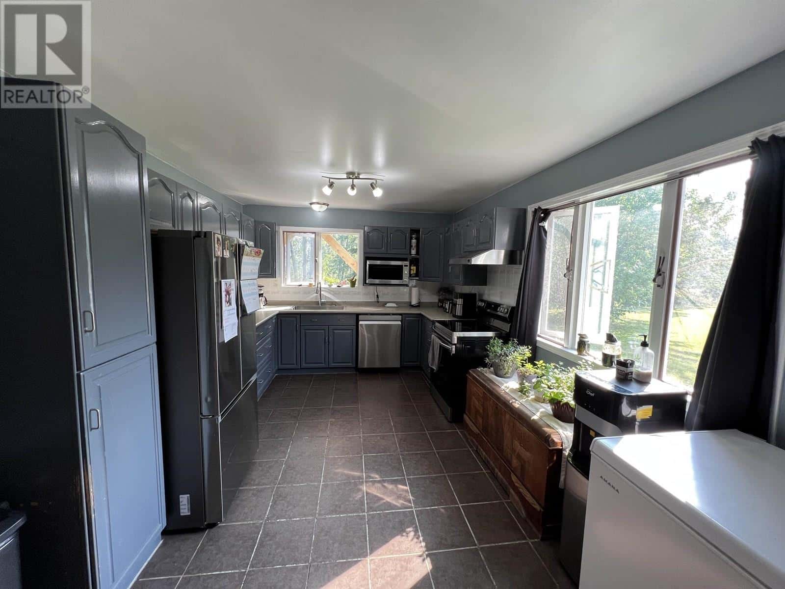 16 WALSH ROAD — Fort Nelson, British Columbia - Photo 5 of 38