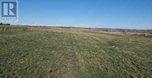 48033 295 Avenue E — De Winton, Alberta - Photo 4 of 9