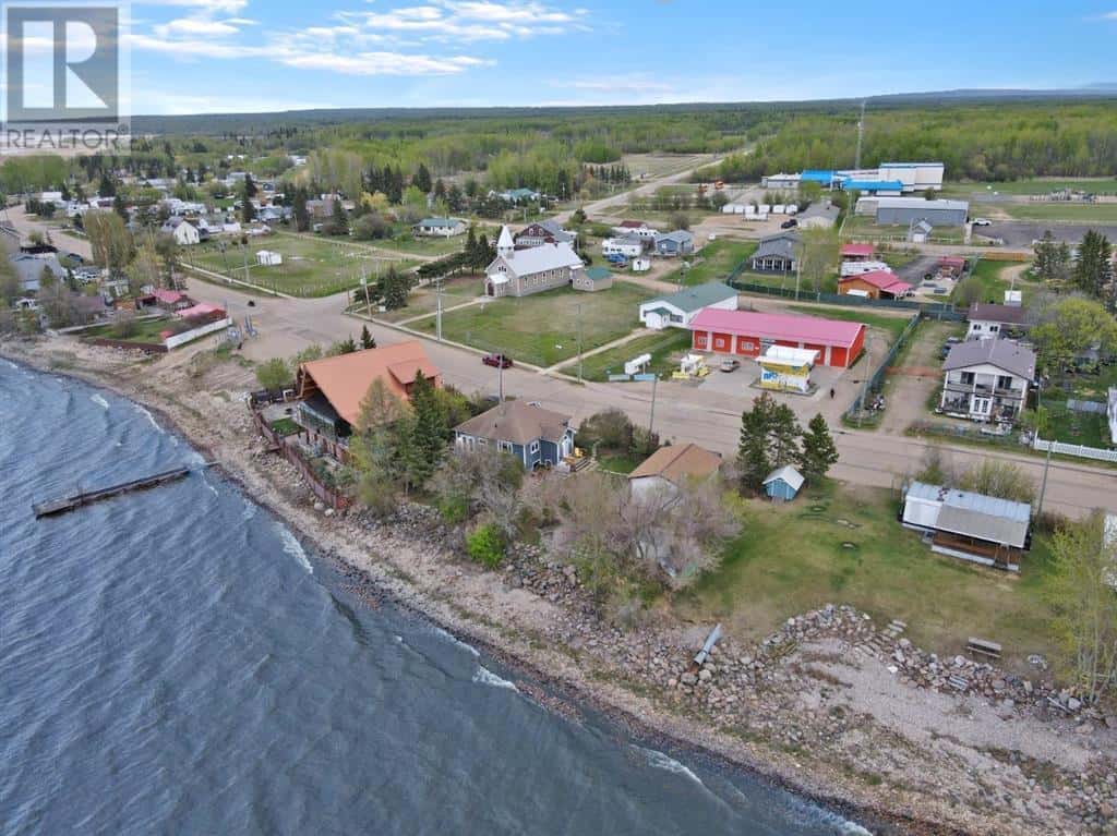 75 Peace River Avenue — Joussard, Alberta - Photo 2 of 43