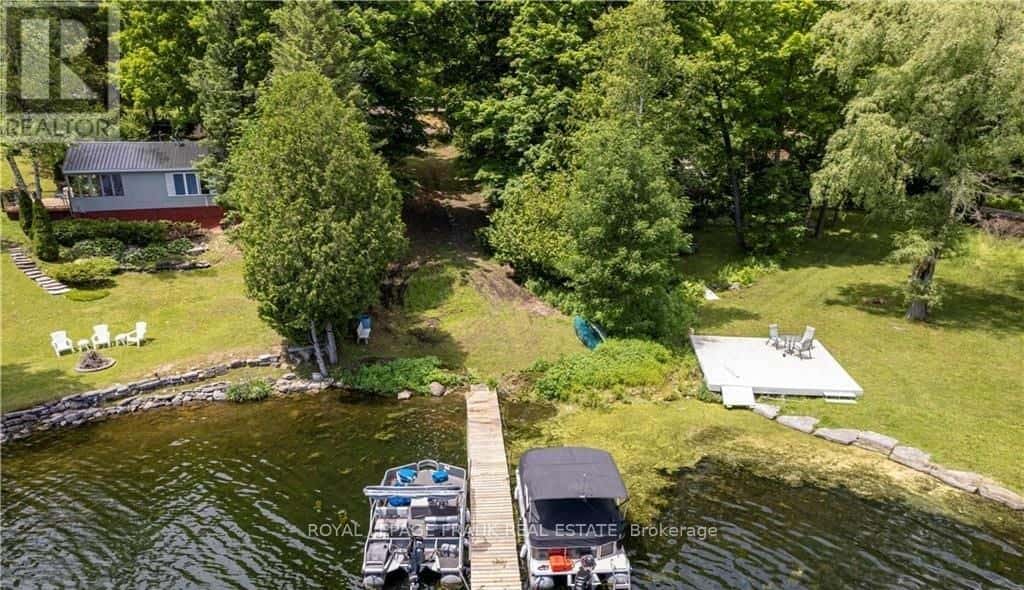 8 FIRE ROUTE 27 — Trent Lakes, Ontario - Photo 2 of 26