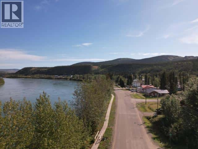 102- MCDADE ROAD — Carmacks, Yukon - Photo 4 of 33