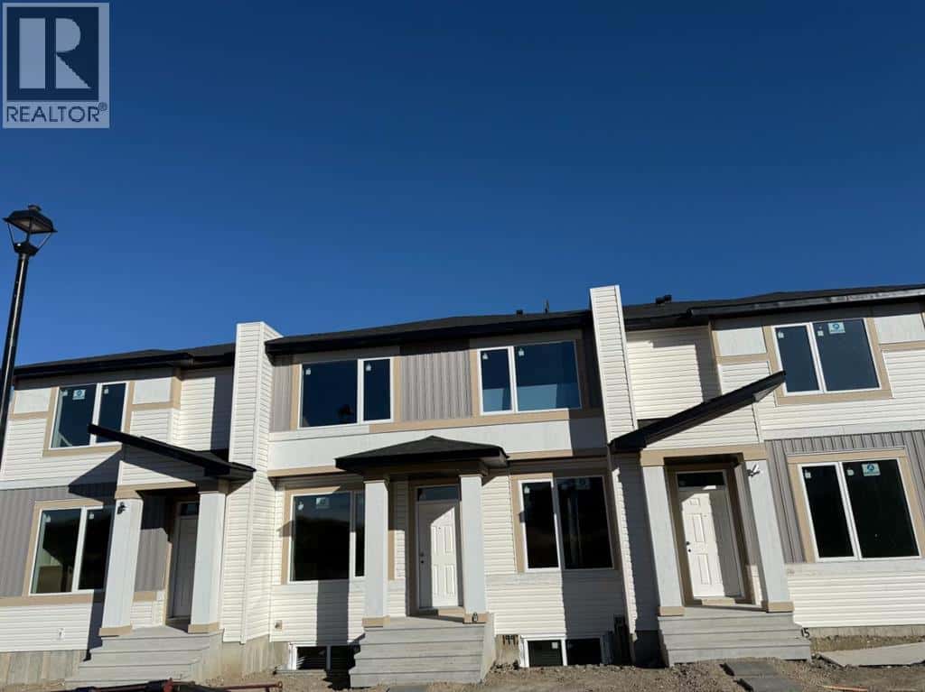 1995 McCaskill Drive — Crossfield, Alberta - Photo 4 of 5