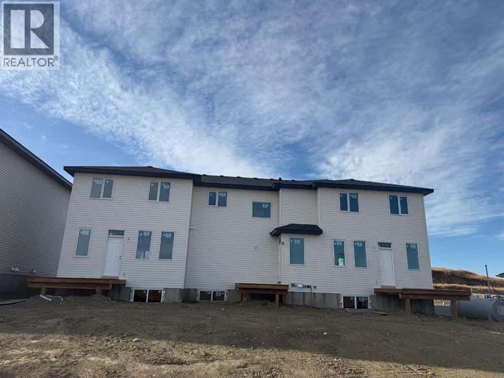 1995 McCaskill Drive — Crossfield, Alberta - Photo 5 of 5