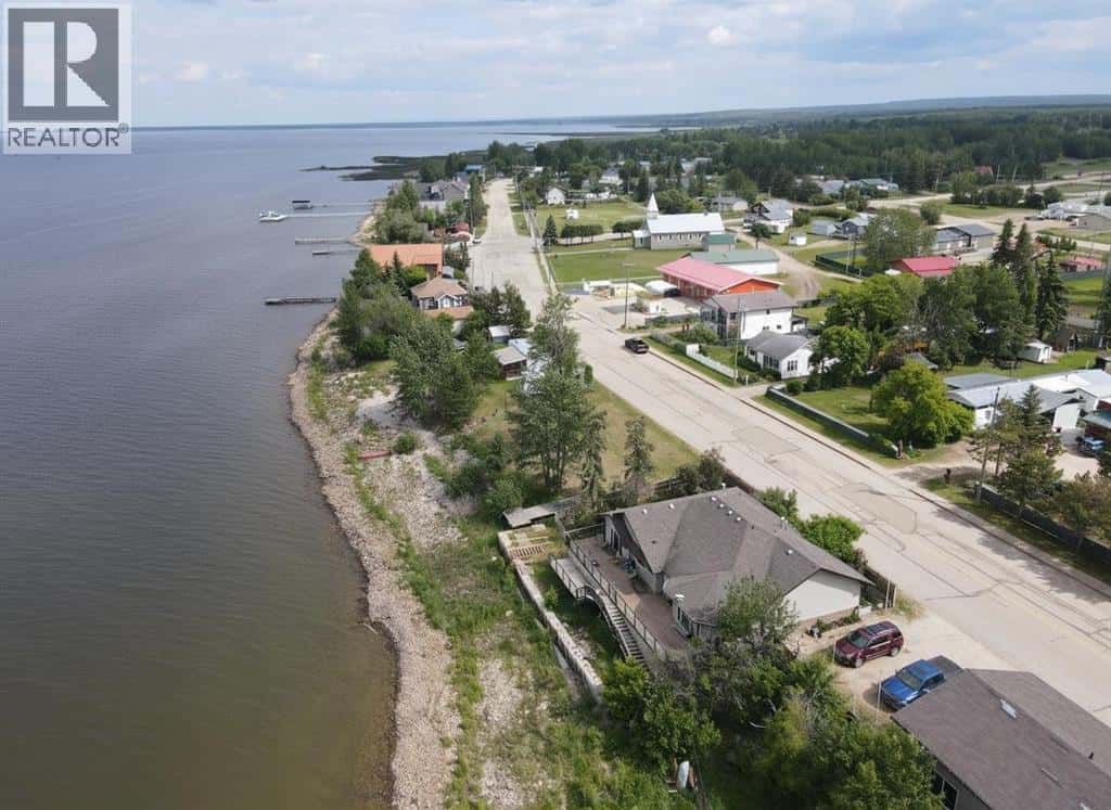 81 Peace River Avenue — Joussard, Alberta - Photo 3 of 37