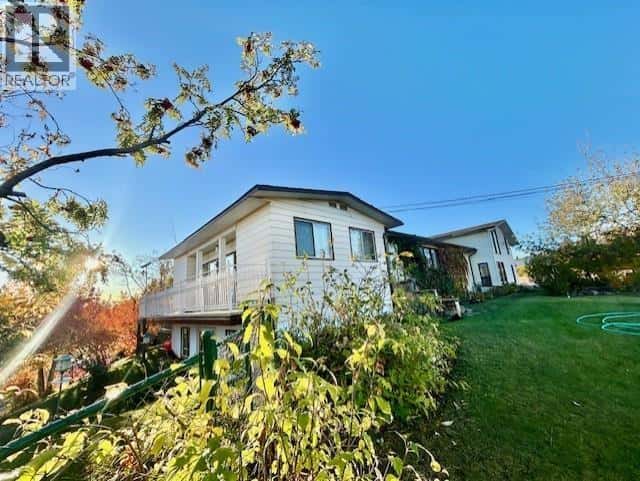 5403 LIARD STREET — Fort Nelson, British Columbia - Photo 2 of 40