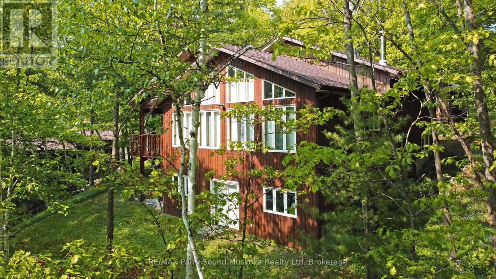 38 SHEBESHEKONG ESTATES ROAD S — Carling, Ontario - Photo 2 of 50