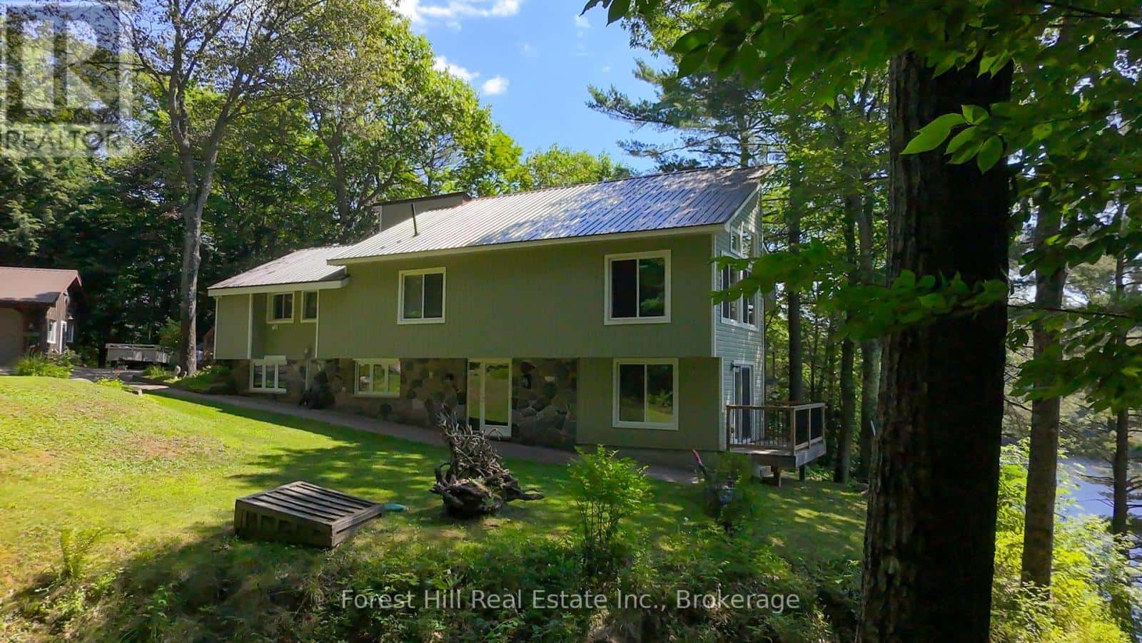 1289 DELBROOKE ROAD — Lake of Bays (Ridout), Ontario - Photo 2 of 50