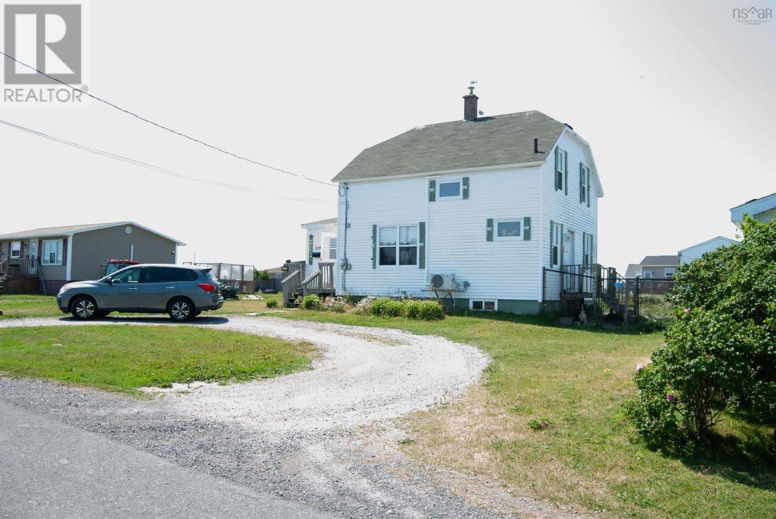 319 Cockburn Street — New Waterford, Nova Scotia - Photo 2 of 39