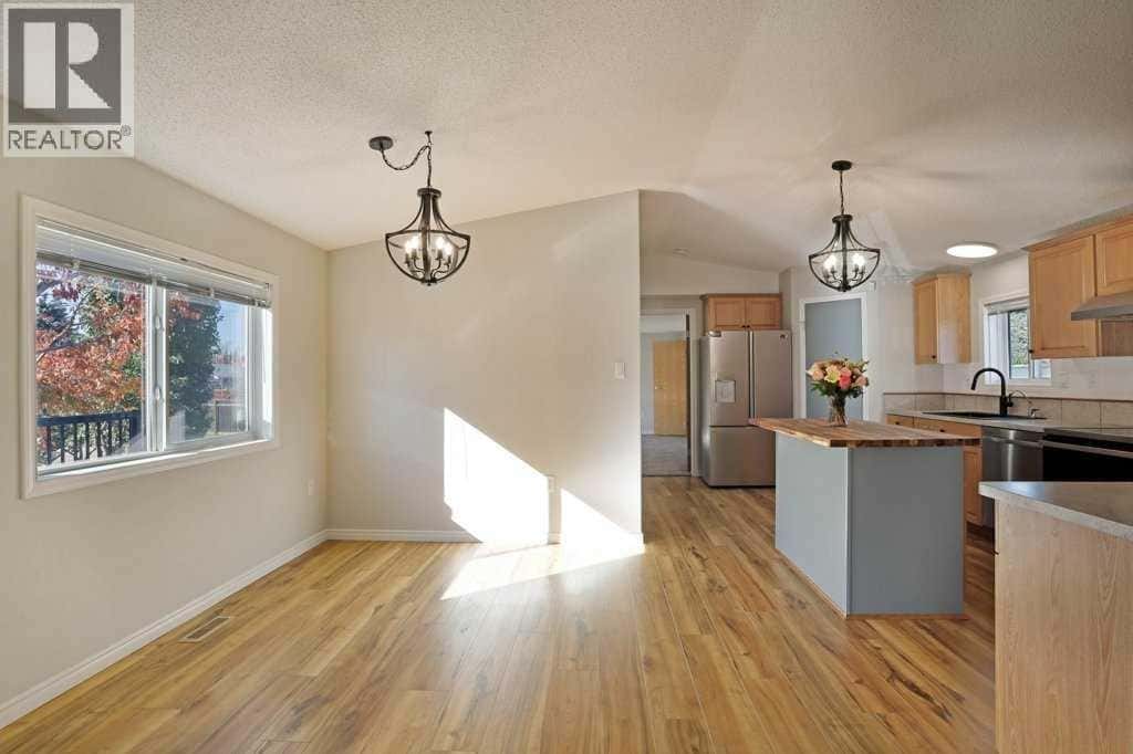 57 RoseGlen Drive — Rosemary, Alberta - Photo 4 of 37