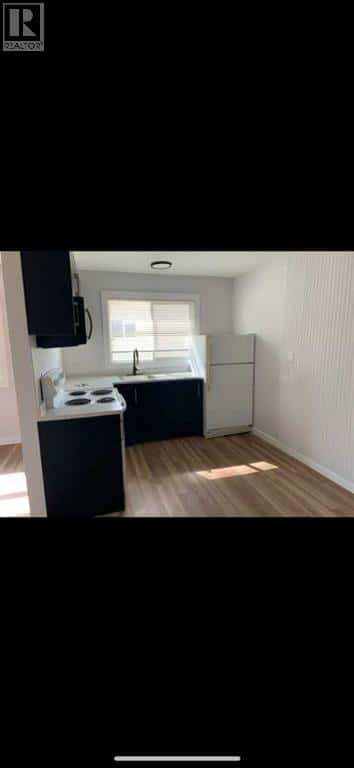 9510 100 Avenue — Sexsmith, Alberta - Photo 5 of 12