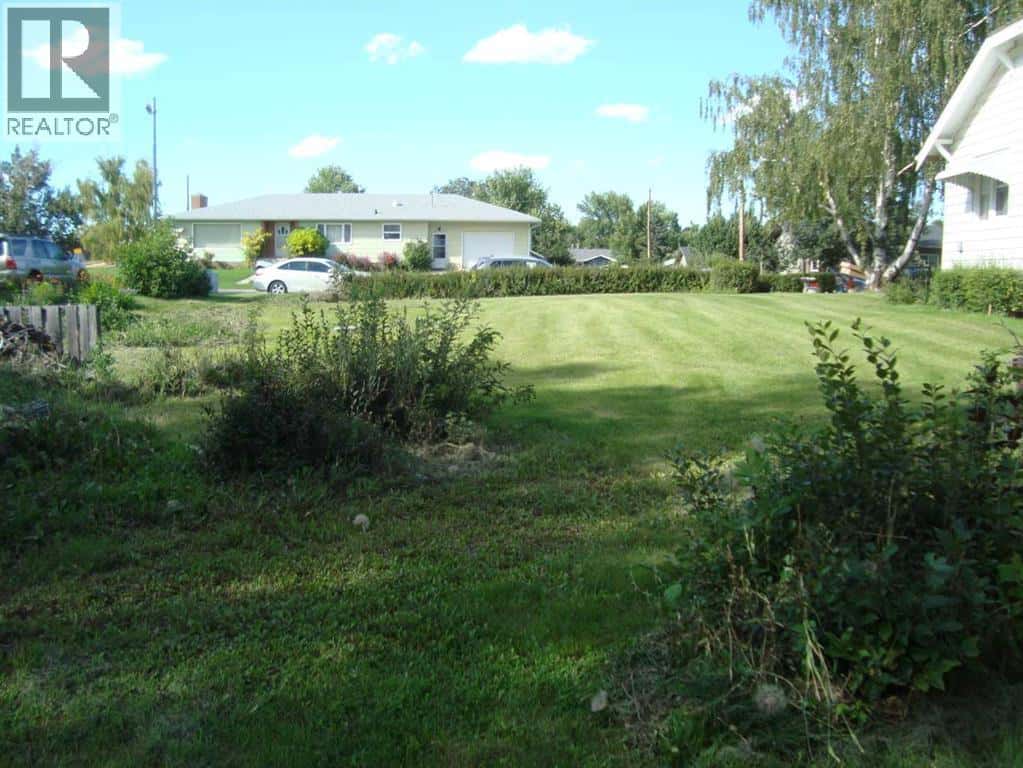 4931 49 Avenue — Stavely, Alberta - Photo 2 of 4