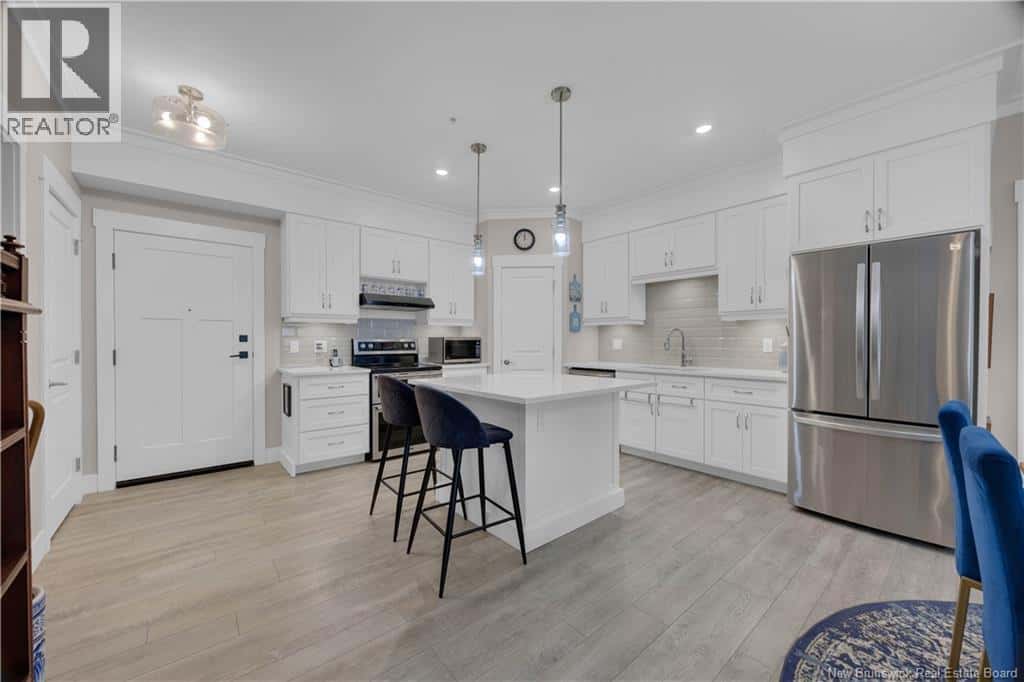 52 Hampton Road Unit# 102 — Rothesay, New Brunswick - Photo 3 of 32