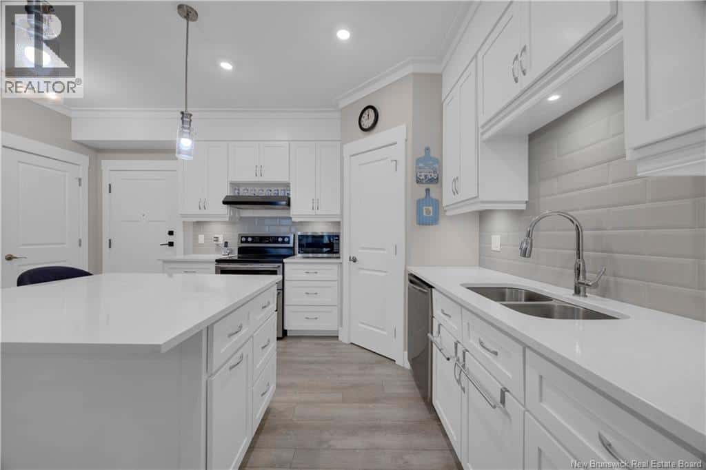 52 Hampton Road Unit# 102 — Rothesay, New Brunswick - Photo 4 of 32