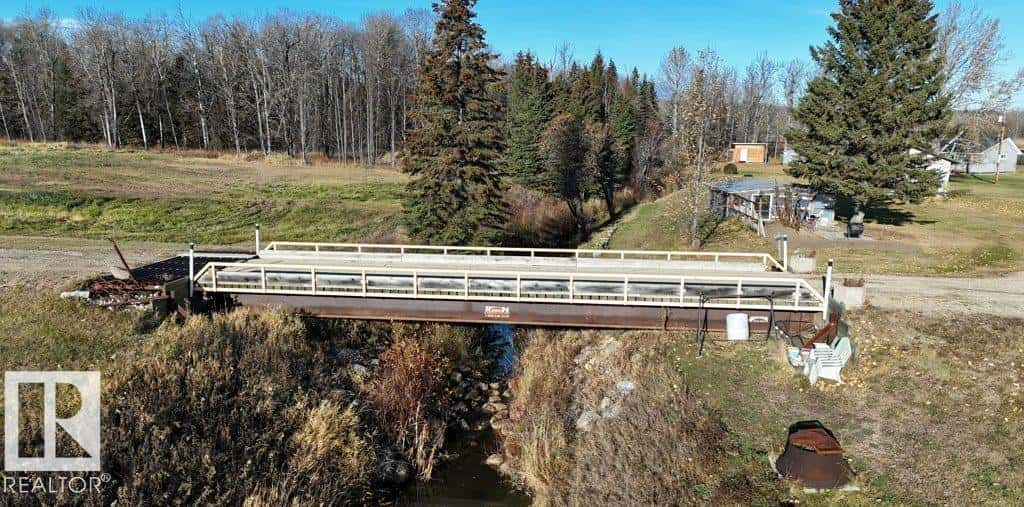 101034A TWP ROAD 590 — Rural Woodlands County, Alberta - Photo 2 of 51