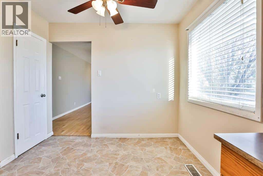 421 52 Avenue — Coalhurst, Alberta - Photo 2 of 21