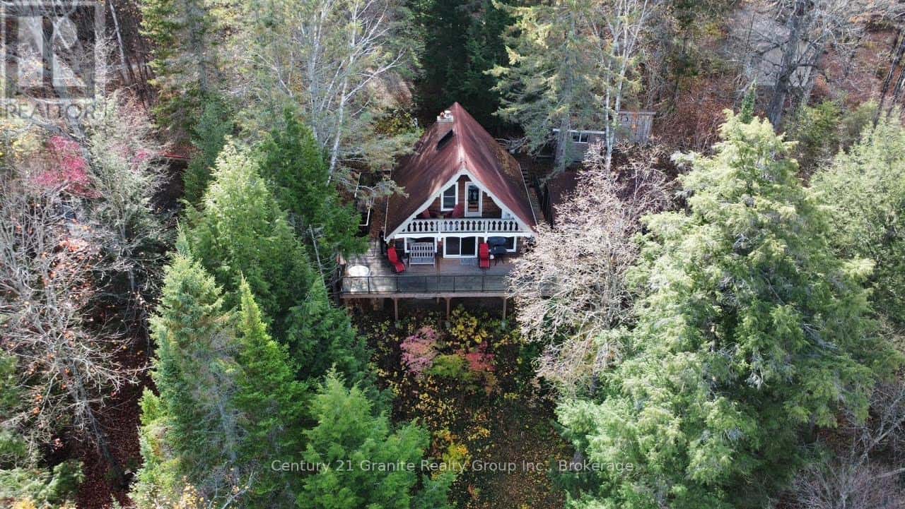 1038 BROKEN PADDLE ROAD — Dysart et al (Dudley), Ontario - Photo 3 of 50