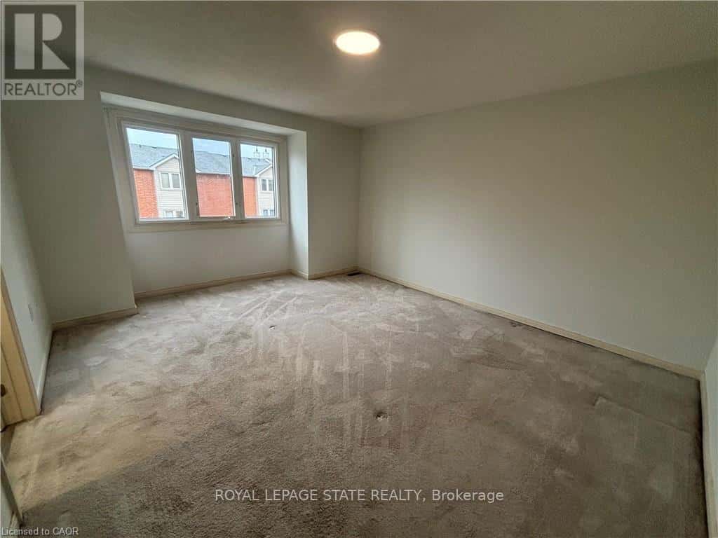 72 STONE CHURCH ROAD W — Hamilton (Gourley), Ontario - Photo 4 of 19