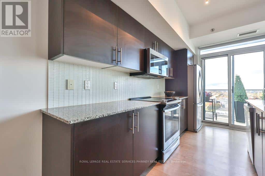 1709 - 55 SPEERS ROAD — Oakville (QE Queen Elizabeth), Ontario - Photo 4 of 36