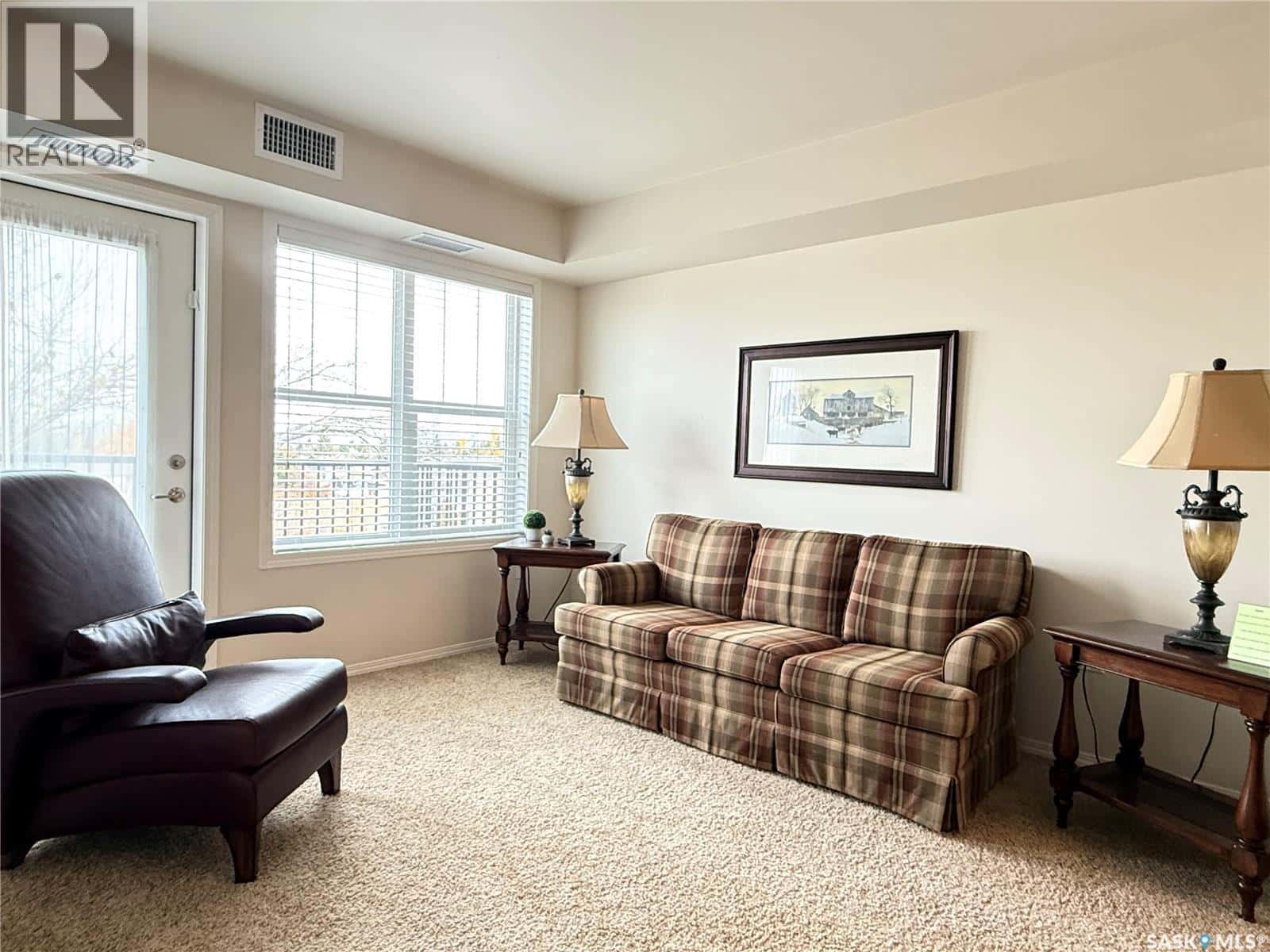 222 680 7th AVENUE E — Melville, Saskatchewan - Photo 4 of 27