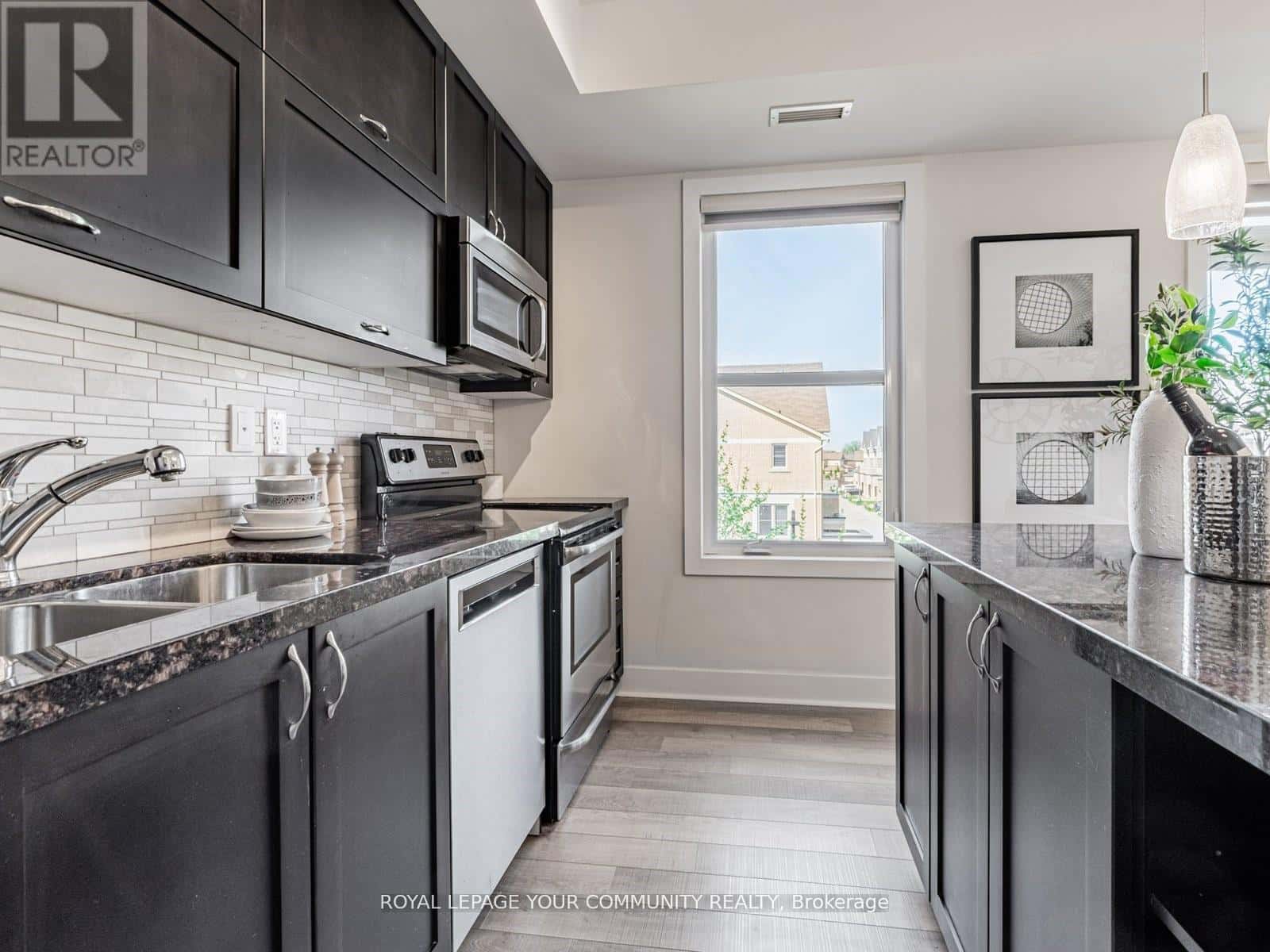 321 - 28 PRINCE REGENT STREET — Markham (Cathedraltown), Ontario - Photo 4 of 23