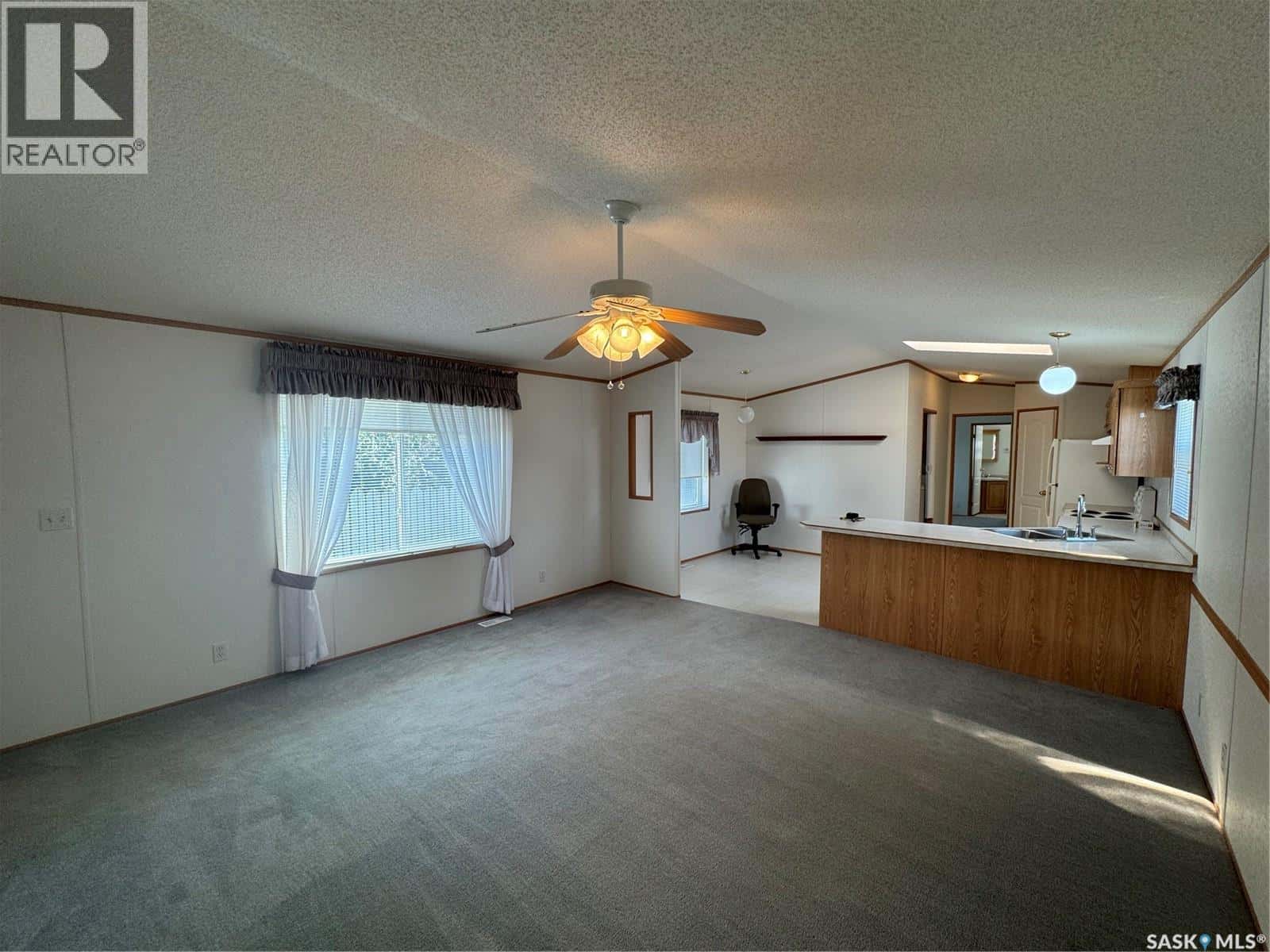 310 Christie STREET — Outlook, Saskatchewan - Photo 4 of 29