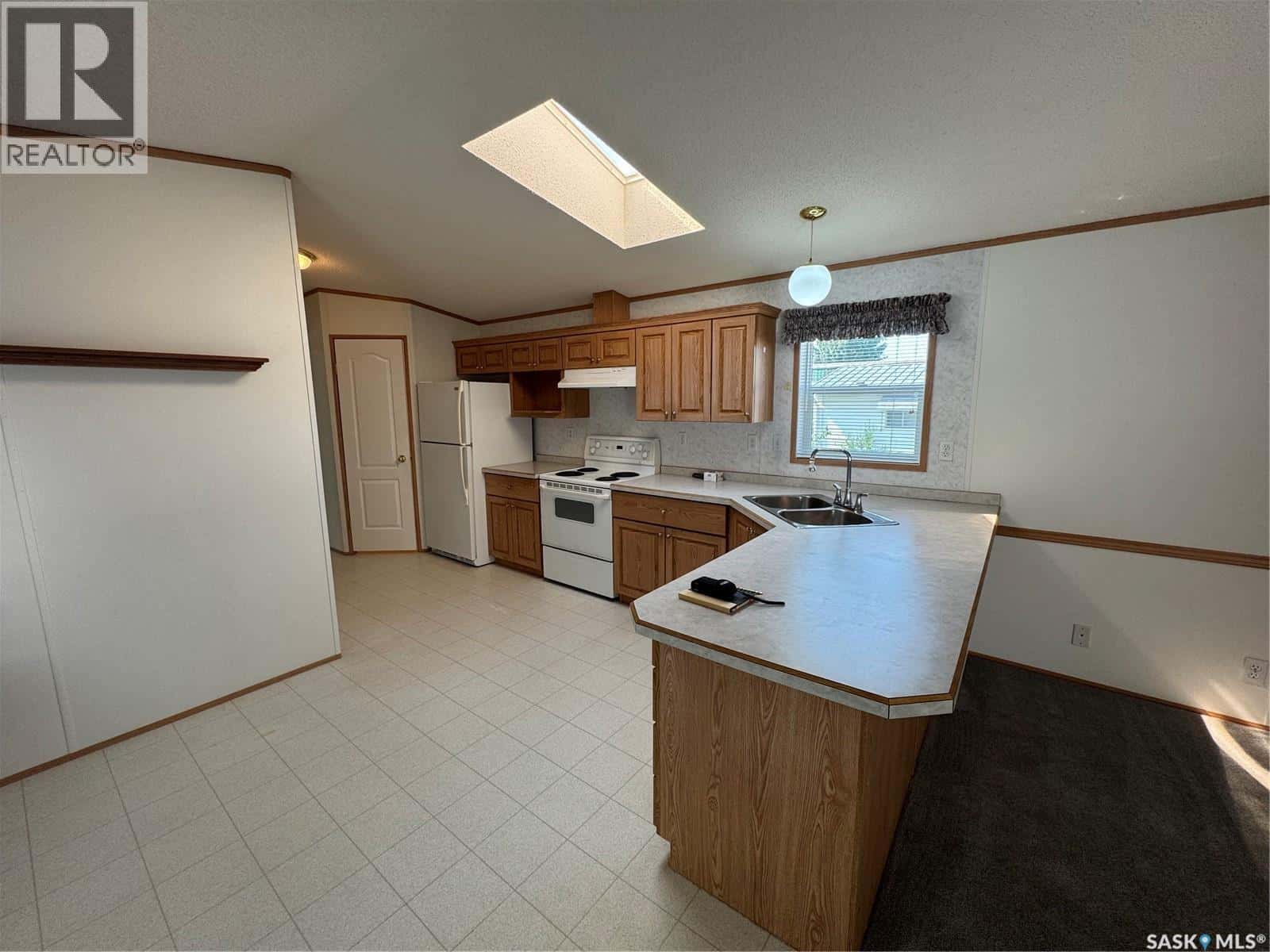 310 Christie STREET — Outlook, Saskatchewan - Photo 5 of 29