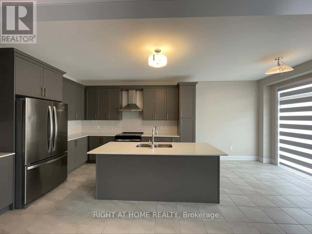 14 SWEET CICELY STREET — Springwater (Midhurst), Ontario - Photo 3 of 18