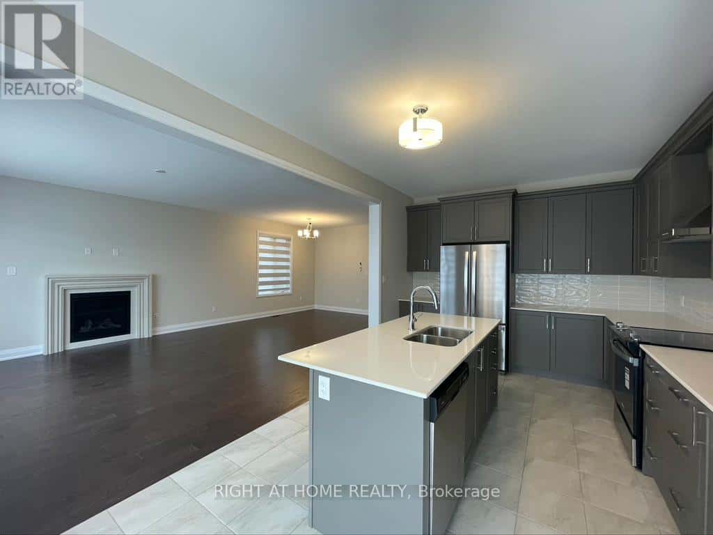 14 SWEET CICELY STREET — Springwater (Midhurst), Ontario - Photo 5 of 18