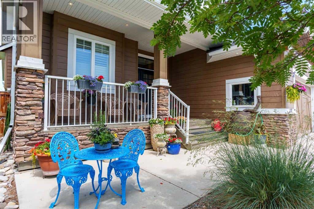 118 Riverwood Crescent SW — Diamond Valley, Alberta - Photo 3 of 40