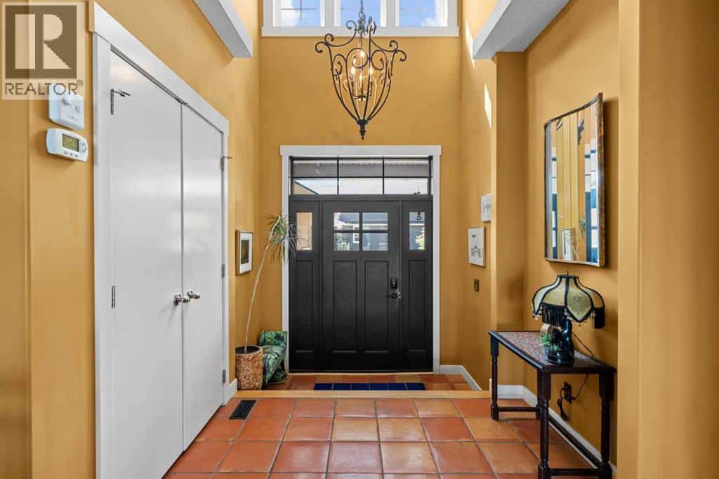 118 Riverwood Crescent SW — Diamond Valley, Alberta - Photo 4 of 40