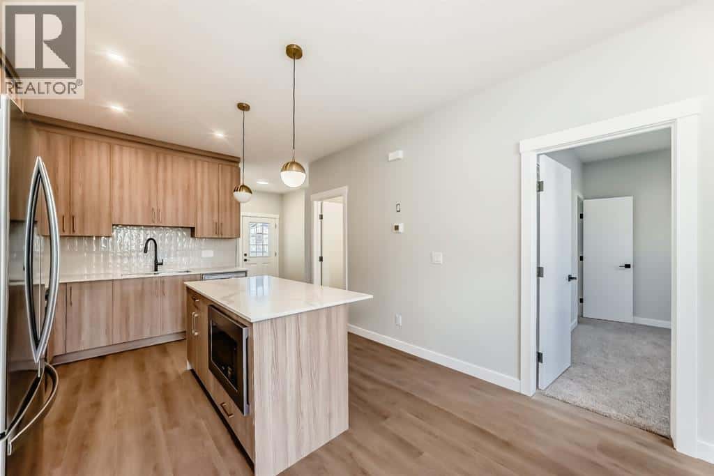 1101 Clover Close — Carstairs, Alberta - Photo 5 of 49