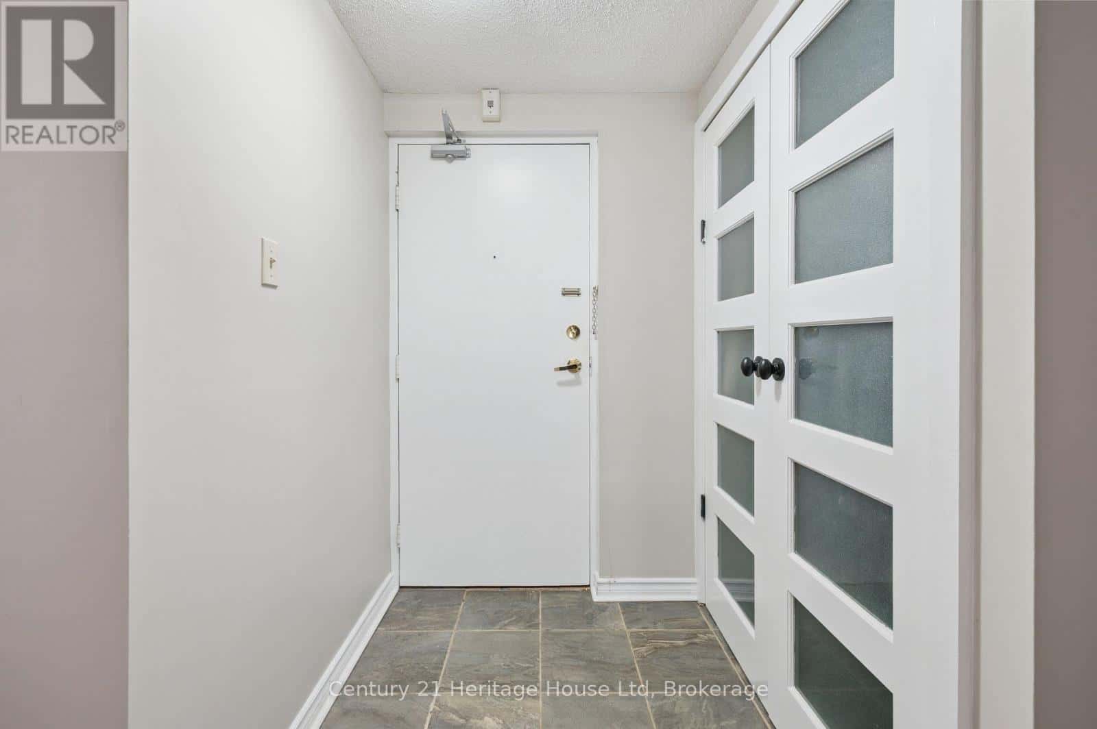 203 - 10 AJAX STREET — Guelph (Junction/Onward Willow), Ontario - Photo 2 of 15