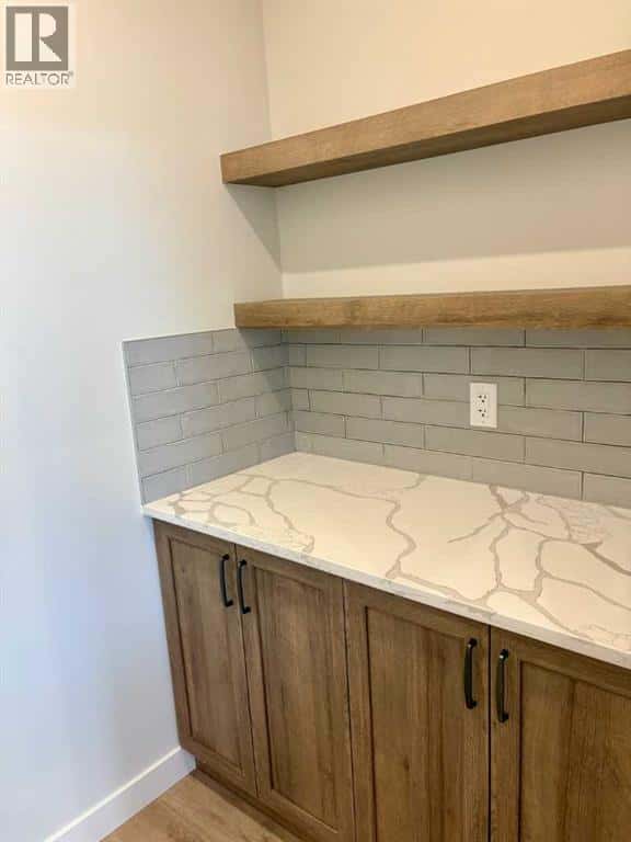 679 Anderson Close NW — Diamond Valley, Alberta - Photo 5 of 16