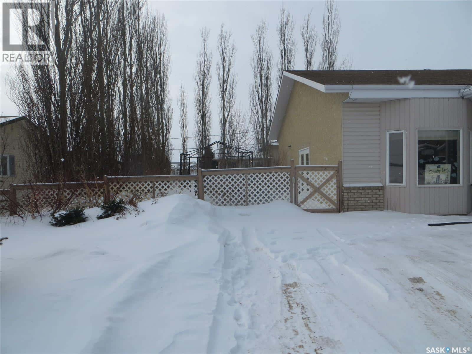 108 8TH STREET — Pilot Butte, Saskatchewan - Photo 3 of 29