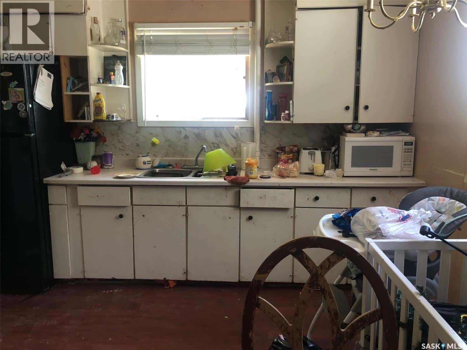 155 Harvey STREET — Kamsack, Saskatchewan - Photo 3 of 26