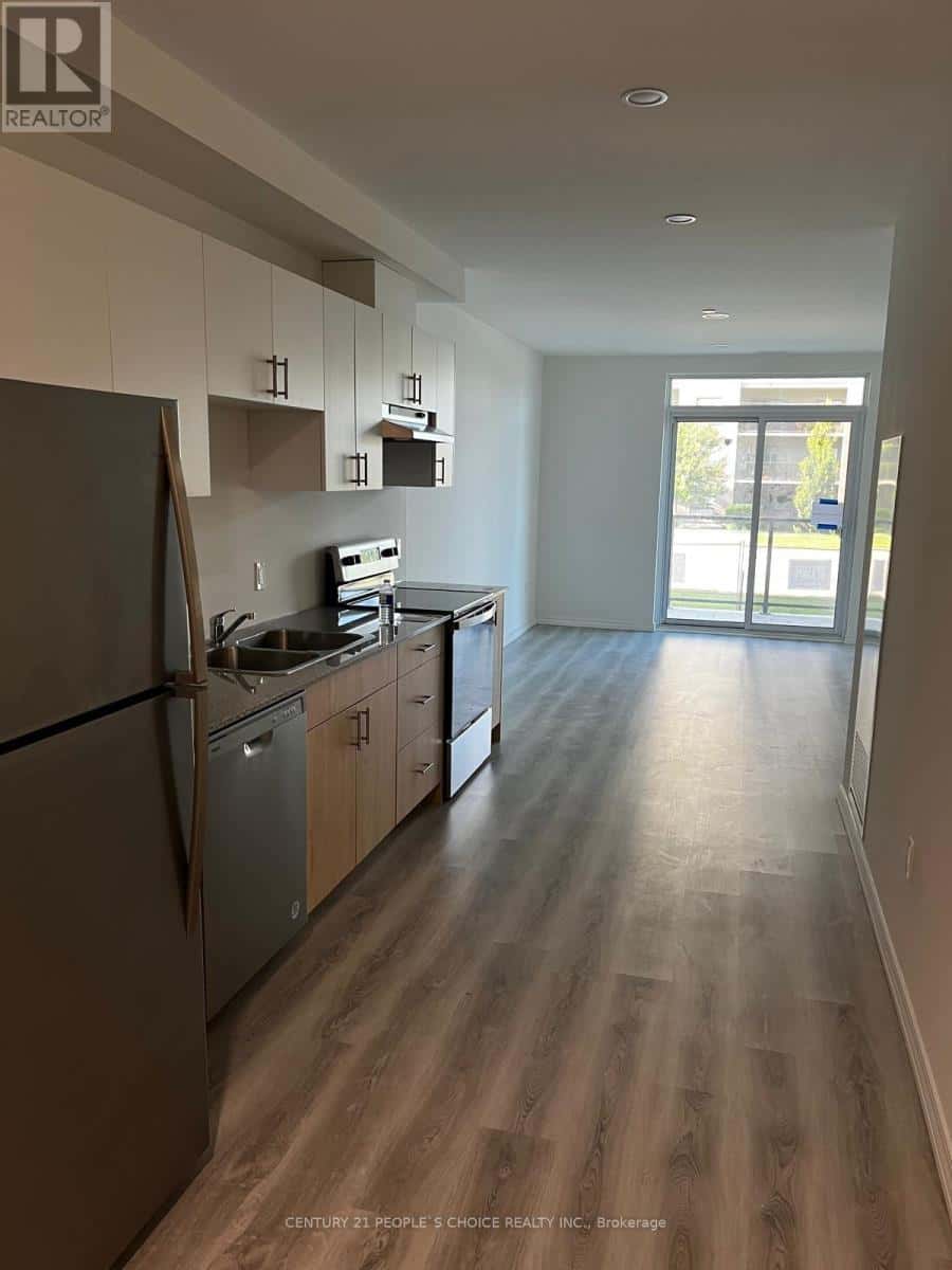 103 B - 181 ELMIRA ROAD S — Guelph (Willow West/Sugarbush/West Acres), Ontario - Photo 2 of 13