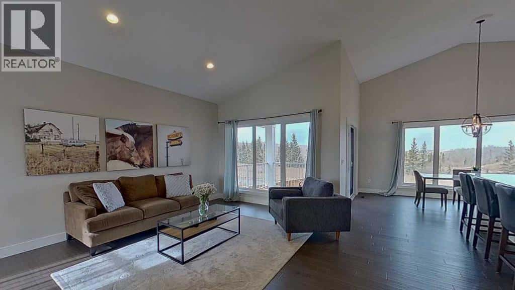 130 Riverwood Crescent SW — Diamond Valley, Alberta - Photo 3 of 42