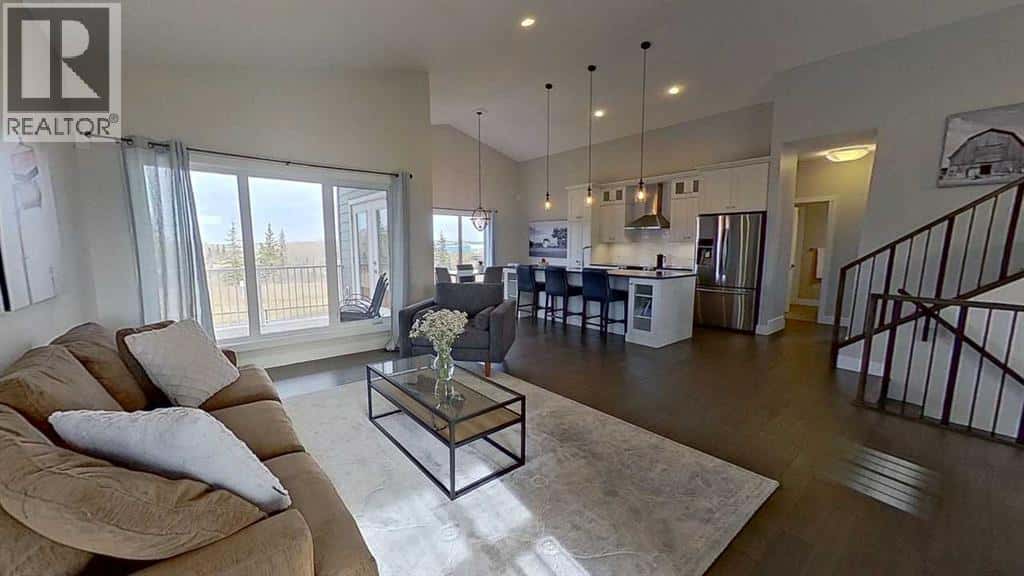 130 Riverwood Crescent SW — Diamond Valley, Alberta - Photo 4 of 42