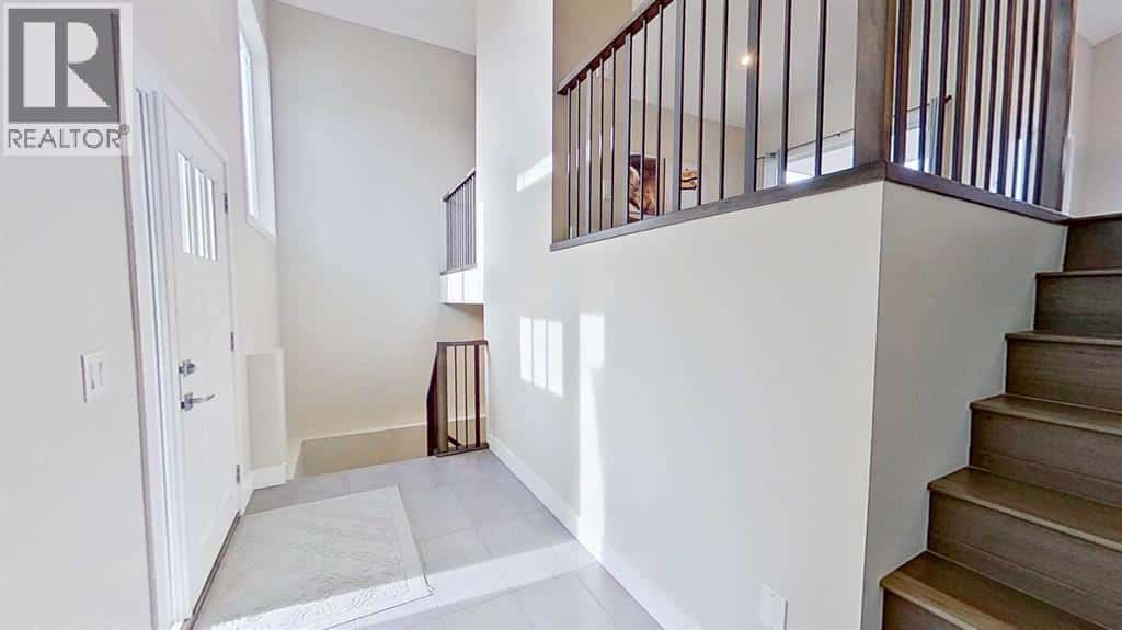 130 Riverwood Crescent SW — Diamond Valley, Alberta - Photo 2 of 42