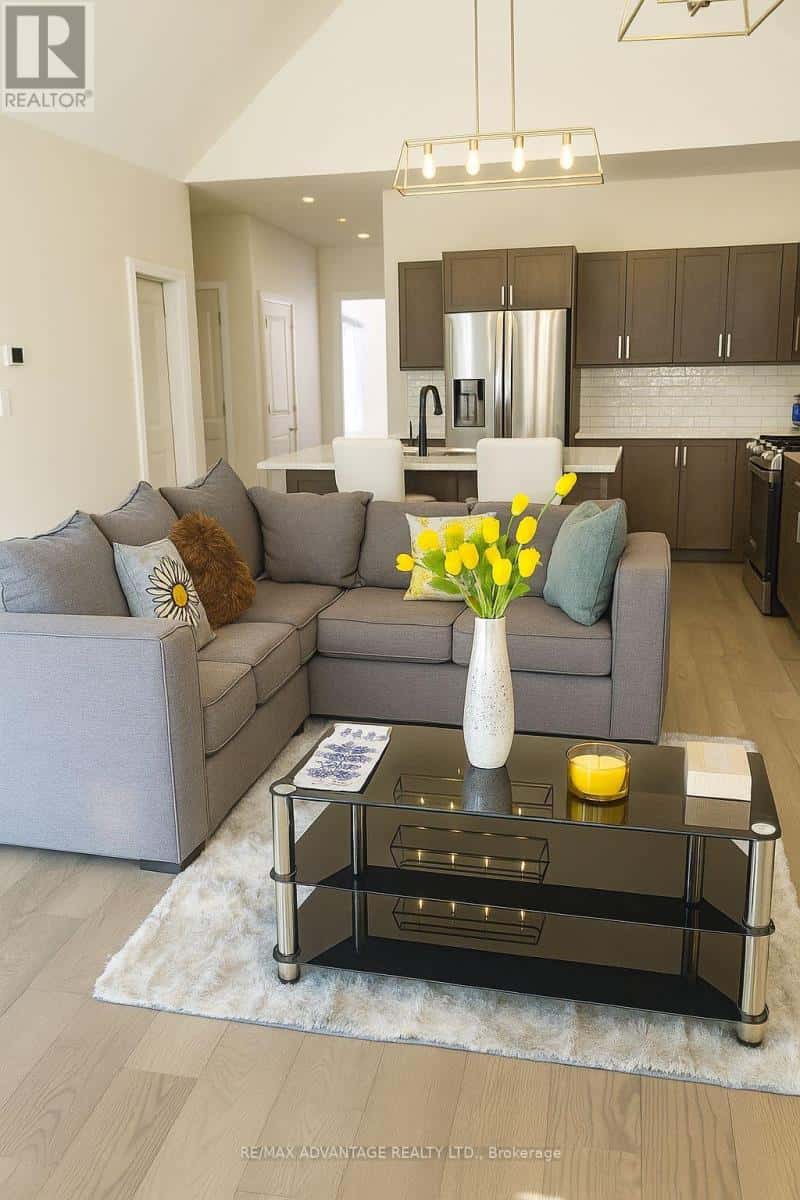 7 - 63 COMPASS TRAIL — Central Elgin (Port Stanley), Ontario - Photo 2 of 14