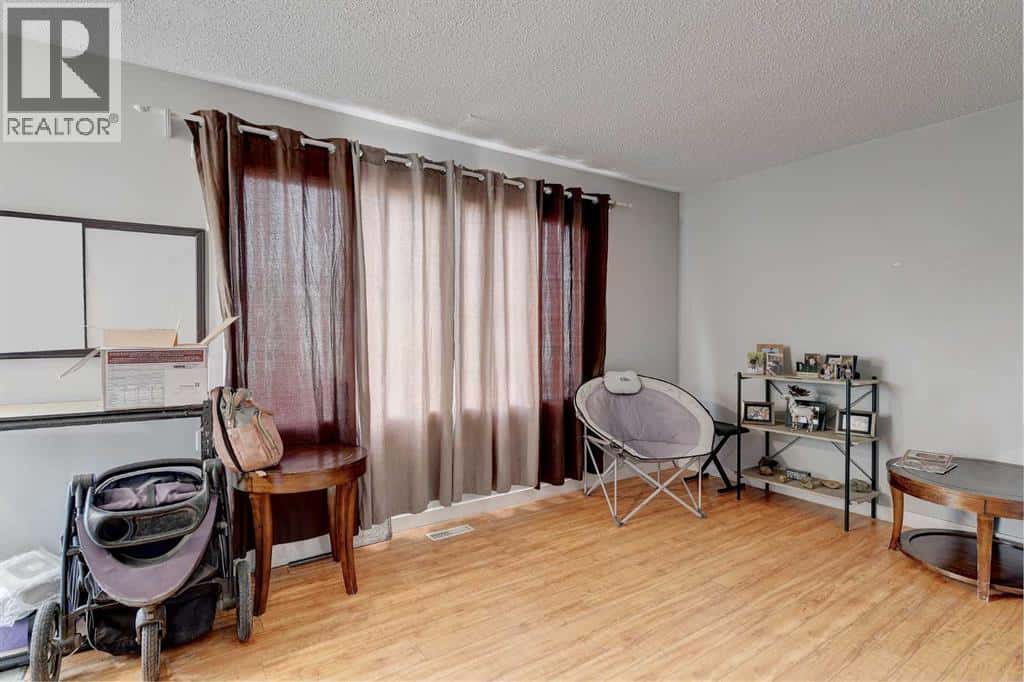 9809 98 Avenue — Sexsmith, Alberta - Photo 3 of 50