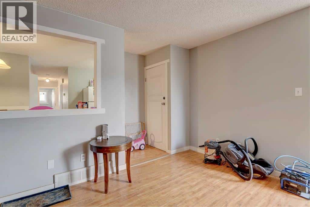 9809 98 Avenue — Sexsmith, Alberta - Photo 5 of 50