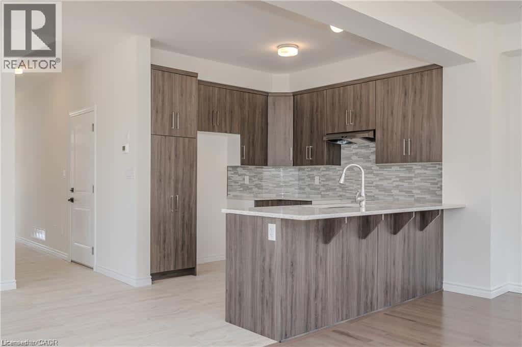 310 ROBERT WOOLNER Street — Ayr, Ontario - Photo 2 of 3