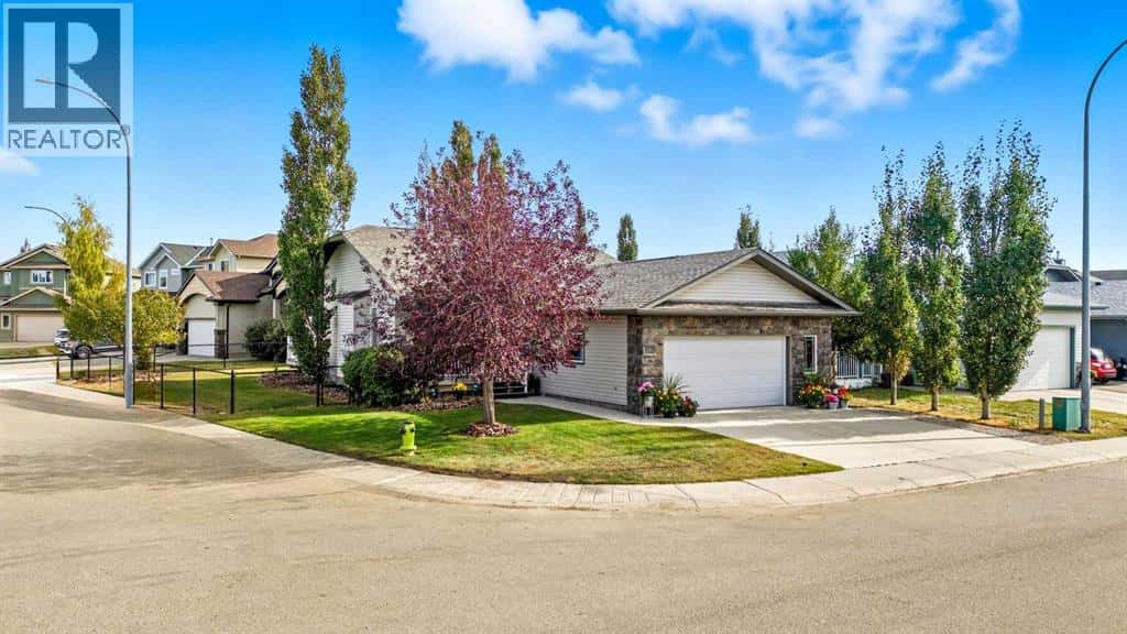 79 Hillcrest Boulevard — Strathmore, Alberta - Photo 2 of 47